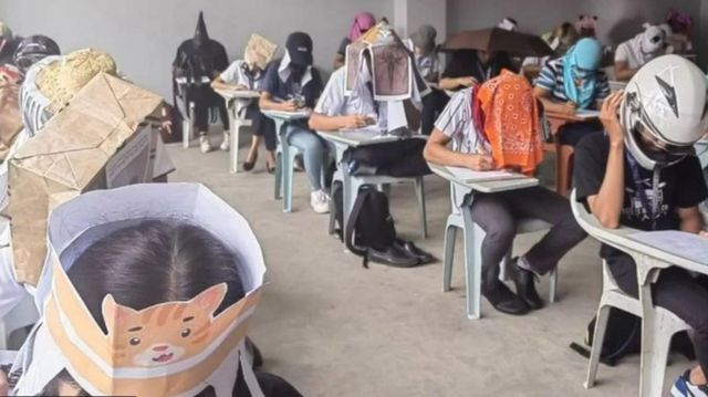 Serangkaian foto siswa, yang disebut "Topi Anti-Kecurangan" selama ujian perguruan tinggi menjadi viral di kalangan pengguna media sosial di Filipina.